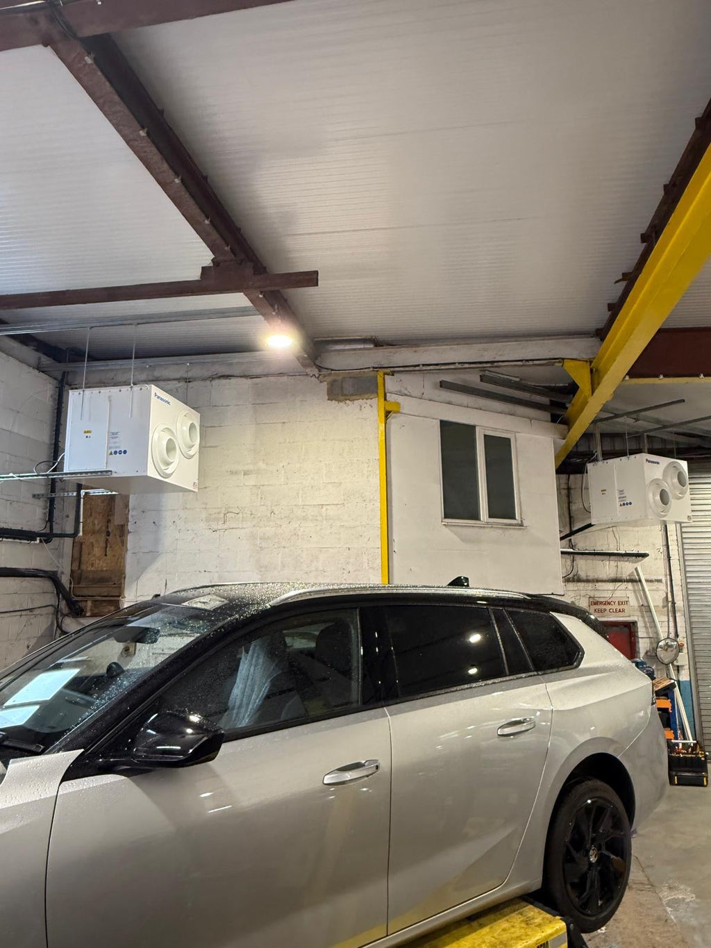 Panasonic Jet Air Stream unit installed in UK car garage workshop