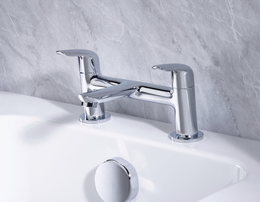 Bristan Aster Bath Filler Chrome tap on a white bath with a gray marble wall background