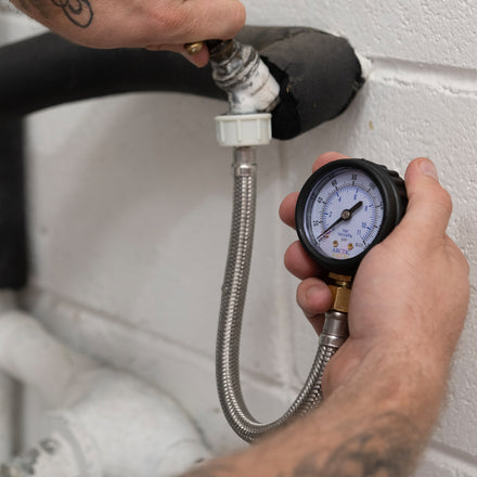 Arctic Hayes Water Pressure Test Gauge Kit WPG1 In use on a tap